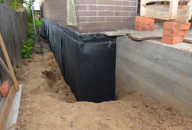 Happy homeowners after waterproofing job in New Trenton